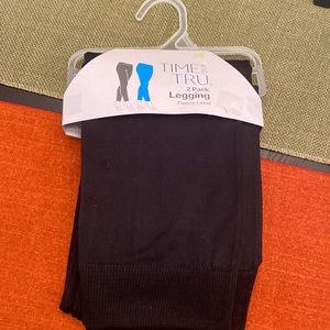 NWT 2 pairs of black fleece lined leggings.